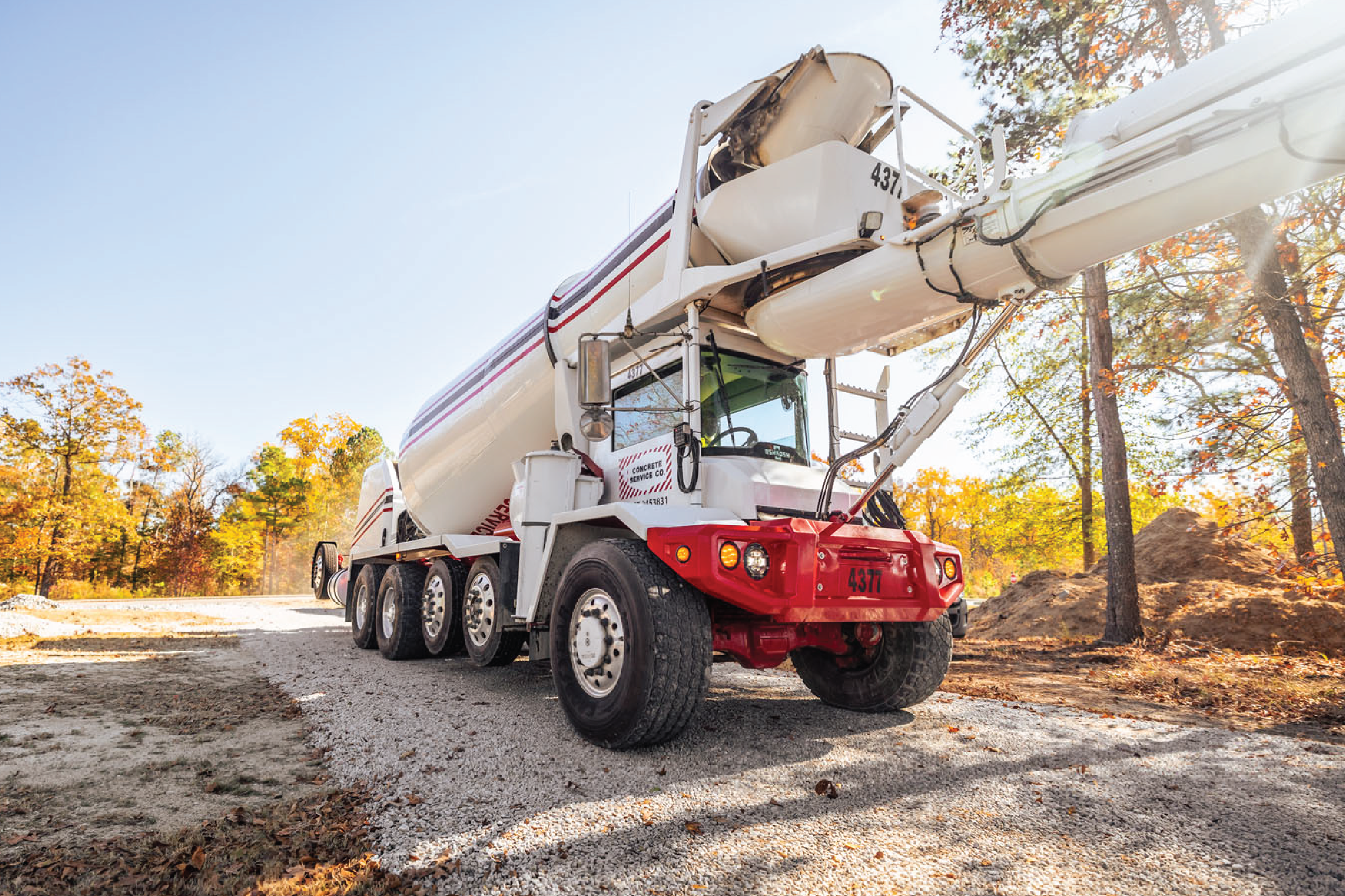 White S-Series front discharge mixer outside on a sunny day on gravel